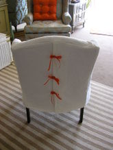 Little_white_wingback_chair_1