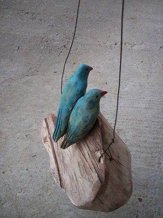 Love birds on a wooden cloud